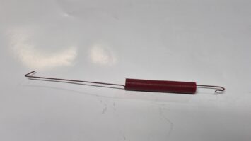 67-74 Mopar A B C Body 318, 383 440 reproduction Automatic Transmission Kickdown Spring.   75 coils red with a black strip. Reference Chrysler part number 2806463